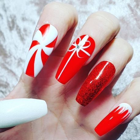 red and white Christmas nails