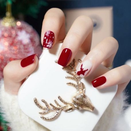 red and white Christmas nails