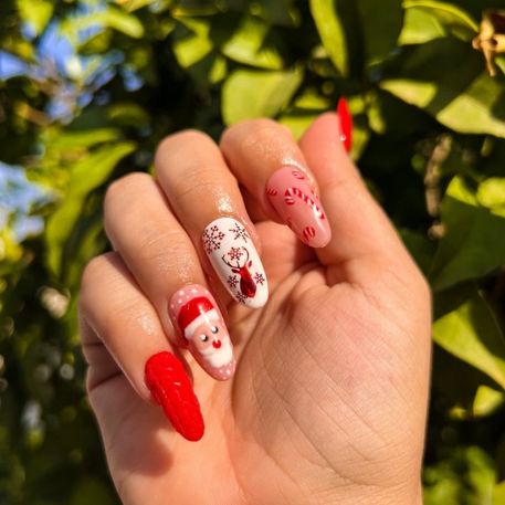 red and white Christmas nails